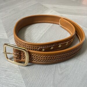 Tan and brown leather belt with brass buckle